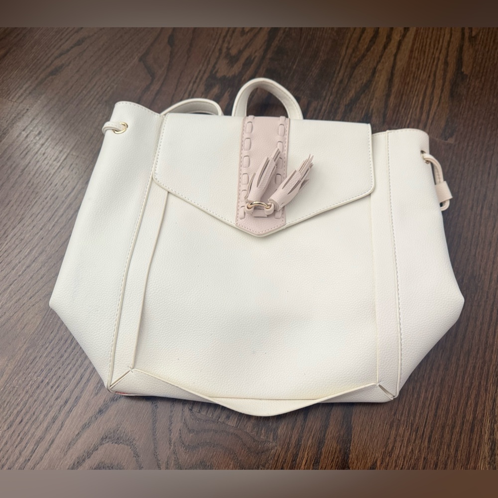 Chic Cream Backpack with Tassel Accent